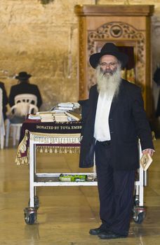 JERUSALEM - SEP 26 : Jewish man prays during the penitential prayers the "Selichot" , held on September 26 2011 in the "Wailing wall"  in  Jerusalem , Israel 