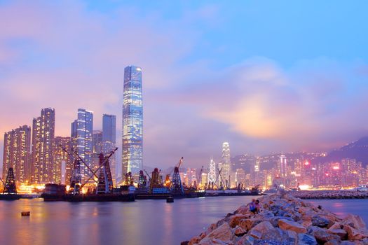 Hong Kong harbour with moving ships at dusk, it shows the prospersity of Hong Kong.