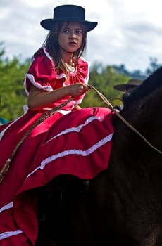 TACUAREMBO, URUGUAY - MAR 5 : Participant in the annual festival "Patria Gaucha" on March 5, 2011 in Tacuarembo, Uruguay. It is one of the biggest festival in South America to celebrate gaucho culture