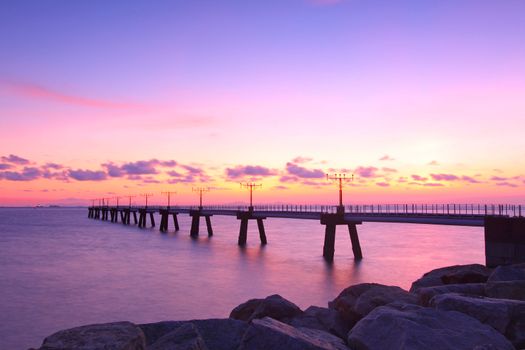 Sunset along the coast with sea stones 