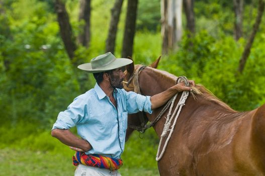 TACUAREMBO, URUGUAY - MAR 5 : Participant in the annual festival "Patria Gaucha" on March 5, 2011 in Tacuarembo, Uruguay. It is one of the biggest festival in South America to celebrate gaucho culture