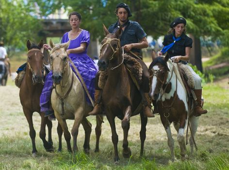 TACUAREMBO, URUGUAY - MAR 5 : Participants in the annual festival "Patria Gaucha" on March 5, 2011 in Tacuarembo, Uruguay. It is one of the biggest festival in South America to celebrate gaucho culture