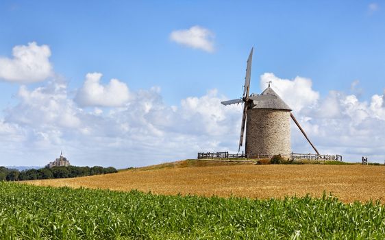 Traditional windmill in the vicinity of Mont Saint Michel monastery in Base Normandy in France.This is "Le Moulin Moidrey".