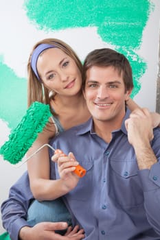 Portrait of happy mature couple looking at camera and smiling