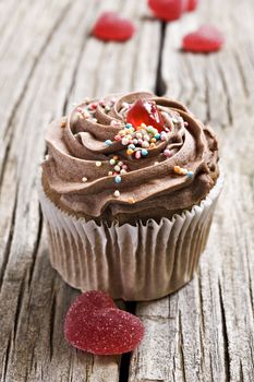 Red heart jelly sweets and chocolate cupcakes