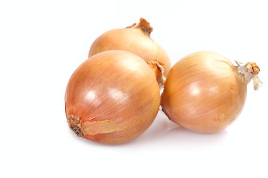 three onions, photo on the white background