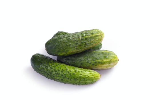 green cucumbers, photo on the white background