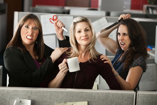 back-stabbing colleagues threatening employee with scissors and knife 