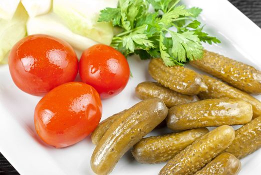 pickled vegetables of tomato, cucumber and cabbage