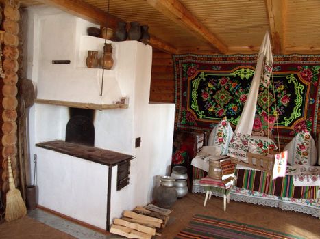  Interior in the ancient house, the typical Ukrainian country home furnace