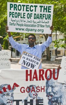 NEW YORK -  JUNE 27 2011 : Unitentified participant in a demonstration against the government of Sudan in front of the UN offices in New York city on June 27 2011