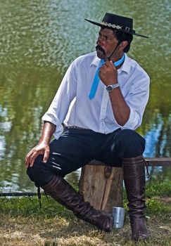 TACUAREMBO, URUGUAY - MAR 5 : Participant in the annual festival "Patria Gaucha" on March 5, 2011 in Tacuarembo, Uruguay. It is one of the biggest festival in South America to celebrate gaucho culture