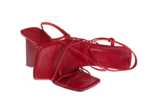Old red shoes, photo on the white background