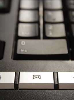 button email, macro shot of black keyboard of computer