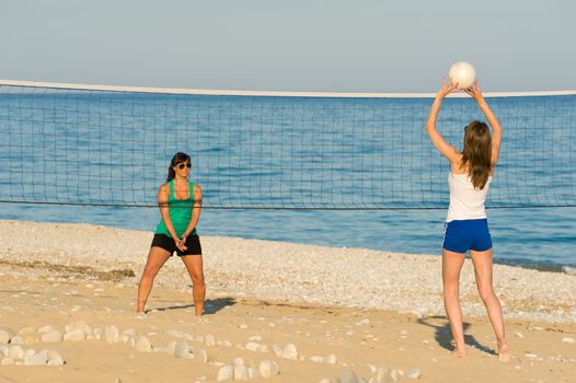 Volleyball match on a sunny Mediterranean beach