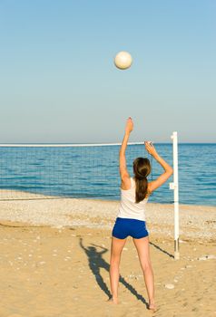 Volleyball match on a sunny Mediterranean beach