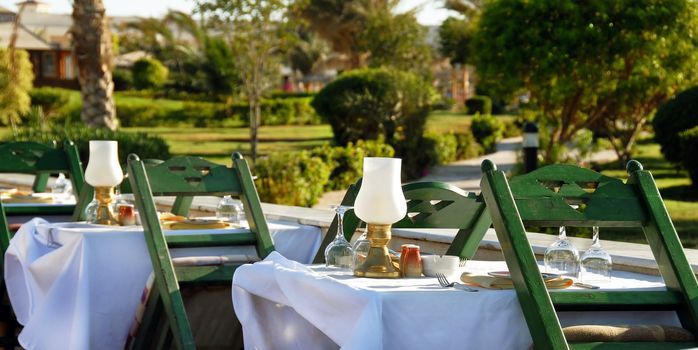 outdoor restaurant in Egypt, table for two, ready for dinner