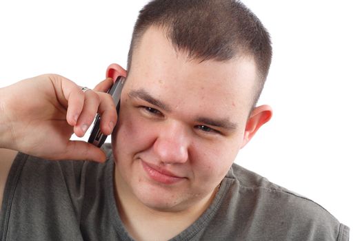 the large man speaks through mobile phone