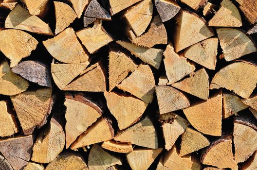 Pile of wood logging for heating stoves and fireplaces