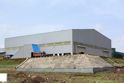 An exterior view of a new factory warehouse in India.