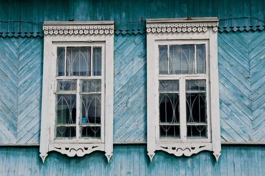 Windows of the Russian old wooden house 