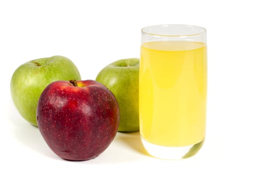 Glass of juice and apples isolated on white