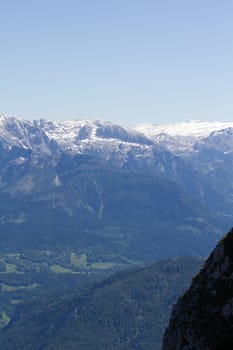 The Alpine mountains of Austria below the warm sun of summer