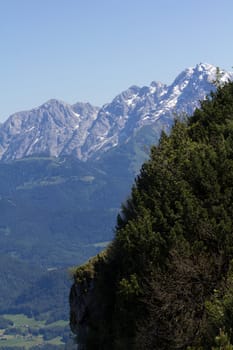 The Alpine mountains of Austria below the warm sun of summer