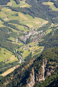 The Alpine mountains of Austria below the warm sun of summer