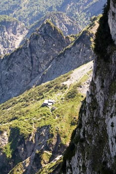The Alpine mountains of Austria below the warm sun of summer