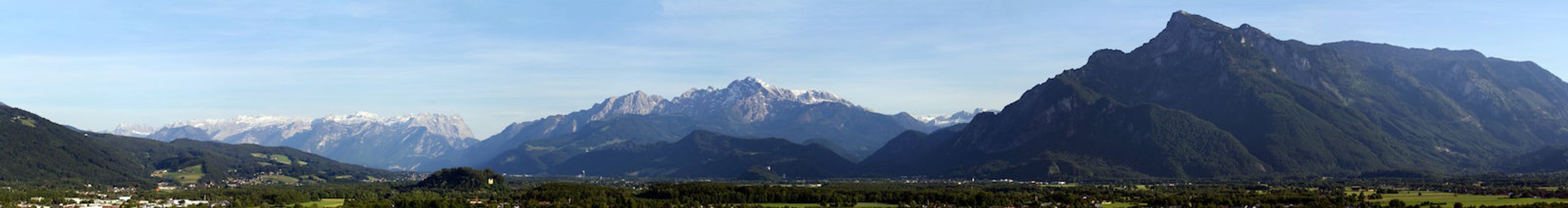 The Alpine mountains of Austria below the warm sun of summer
