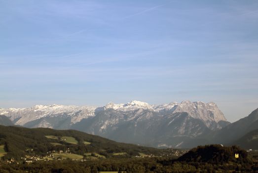 The Alpine mountains of Austria below the warm sun of summer