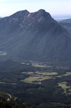 The Alpine mountains of Austria below the warm sun of summer
