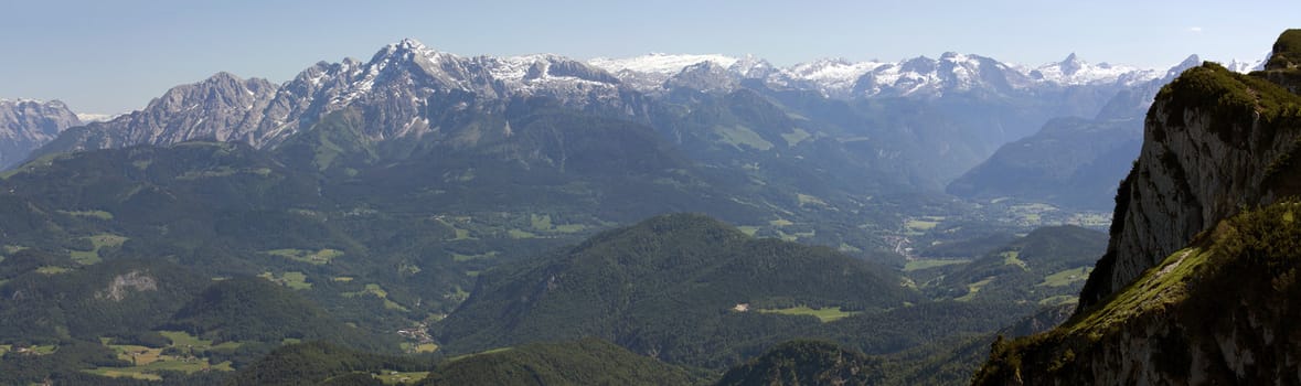 The Alpine mountains of Austria below the warm sun of summer