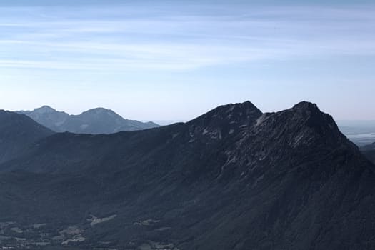 The Alpine mountains of Austria below the warm sun of summer