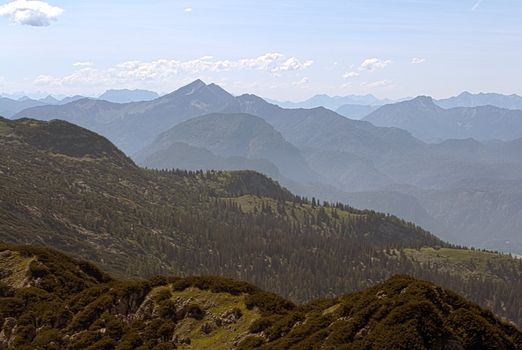 The Alpine mountains of Austria below the warm sun of summer