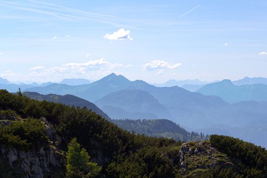 The Alpine mountains of Austria below the warm sun of summer