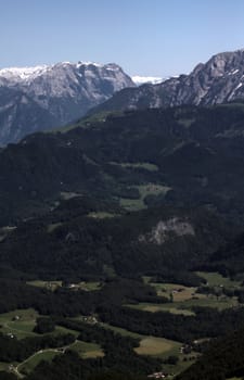 The Alpine mountains of Austria below the warm sun of summer