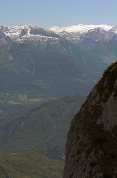 The Alpine mountains of Austria below the warm sun of summer