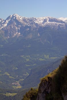 The Alpine mountains of Austria below the warm sun of summer