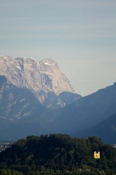 The Alpine mountains of Austria below the warm sun of summer