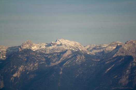 The Alpine mountains of Austria below the warm sun of summer