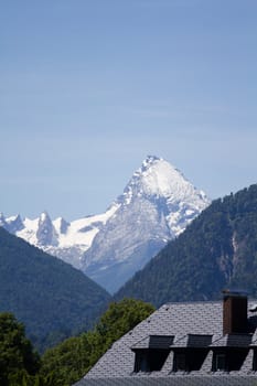 The Alpine mountains of Austria below the warm sun of summer