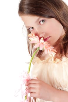 Teenager girl with gerbera isolated on white