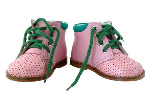 Pink leather baby's boots with green shoe-laces.