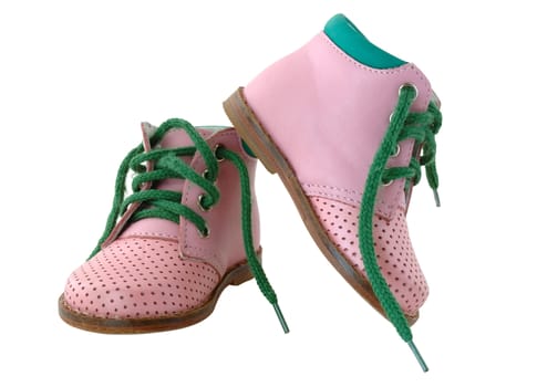 Pink leather baby's boots with green shoe-laces.