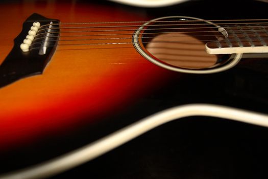 an abstract close up of an acoustic guitar