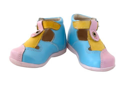 Baby's summer leather boots. Coloured in bright colours - pink, blue and yellow.