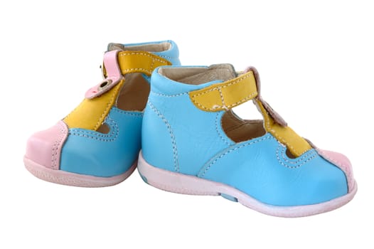 Baby's summer leather boots. Coloured in bright colours - pink, blue and yellow.