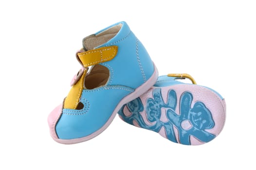 Baby's summer leather boots. Coloured in bright colours - pink, blue and yellow.